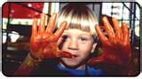 child with painted hands.jpg
